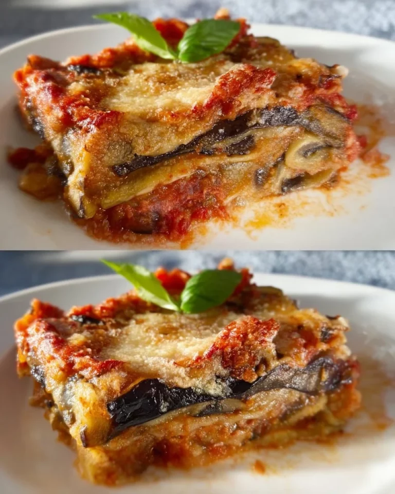 Lasagna di Melanzane alla Parmigiana servita in un piatto rustico.