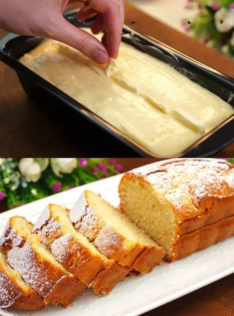 Fetta di Torta al Limone servita su un piatto bianco con decorazioni al limone.