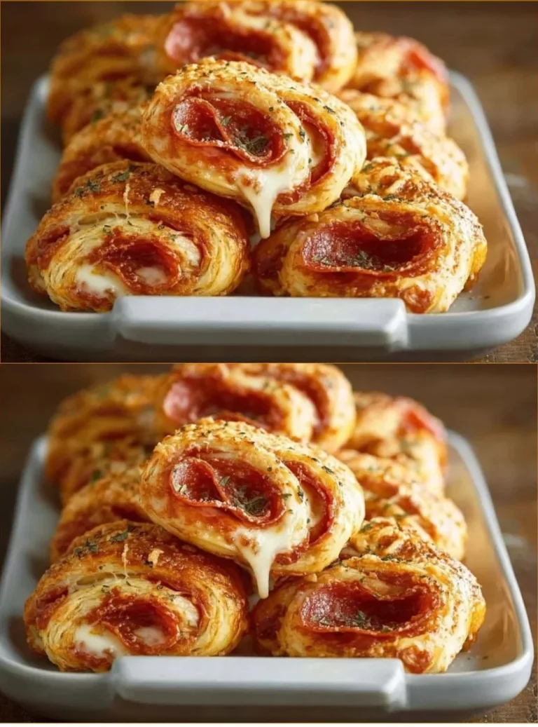 Girelle di pizza con pasta sfoglia pronte da servire per un delizioso aperitivo.