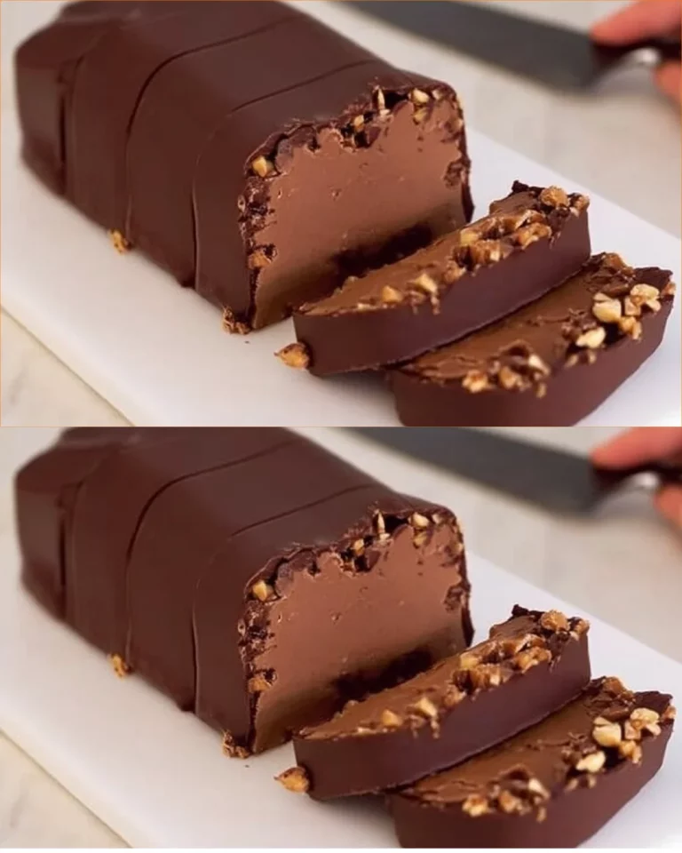 Fetta di torta al cioccolato e nocciole su piatto elegante